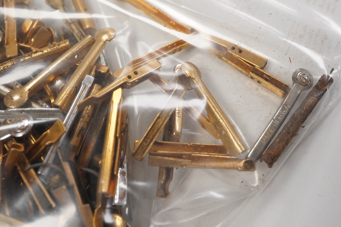 A selection of fountain spares to include levers, blind caps and nibs, some gold